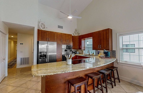 Indian Shores Condo | Spacious and family friendly with pool dock and just steps to the beaches