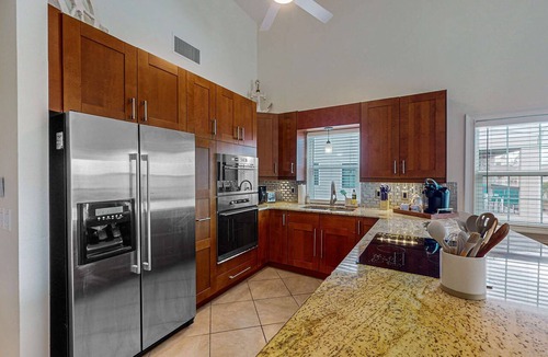 Indian Shores Condo | Spacious and family friendly with pool dock and just steps to the beaches