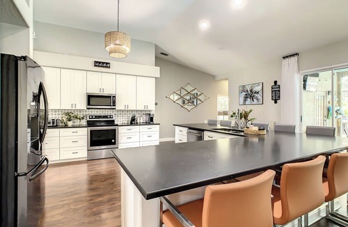 Interchange Square House | Spacious luxury with heated pool.