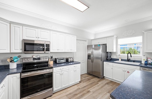 Ono Island House | Spacious Perdido Key Retreat: Sand Volleyball, Dock, Gameroom & Beach
