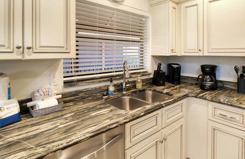 Sanibel Condo | Spacious Retreat with Wrap-Around Lanai and Private Beach - Pet Friendly - Signal Inn 14