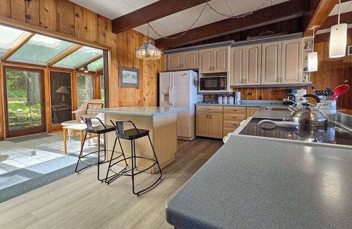 Frankfort House | Spacious vacation gem on Crystal Lake w/gas fireplace, WiFi, central AC, firepit
