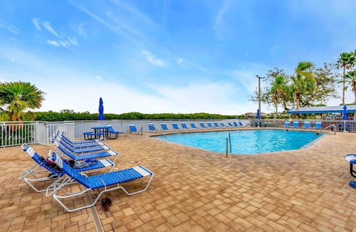 Ruskin Apartment | Spot Dolphins! Balcony & Heated Pool, Hot Tub!