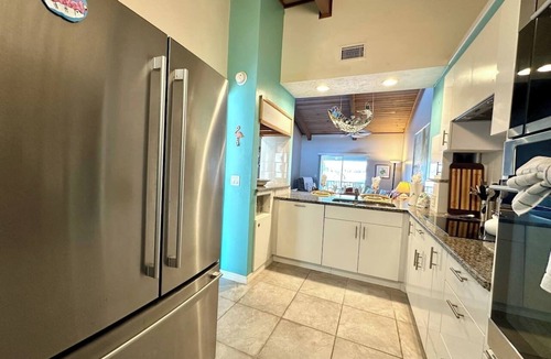 Grove City Condo | Spot manatees from your balcony