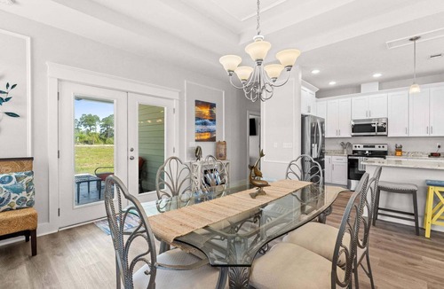 Eastpoint House | St. George Sound Home Pool, Game Room, Fire Pit, Steps to Water – Forgotten Coast Escape