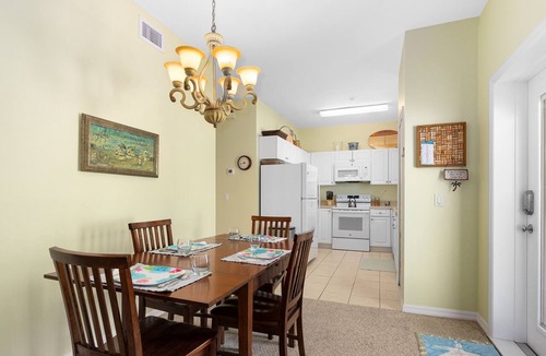 New Smyrna Beach Condo | Stay ON Flagler Avenue! Charming Condo with Full Kitchen, Parking and Courtyard!