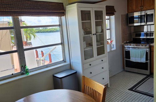 Hollywood Condo | Steps to beach, directly on intracoastal waterway, boat dock & parking included