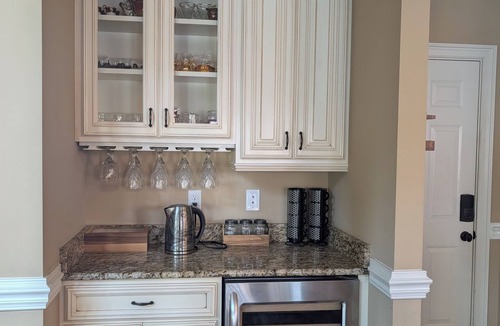 Evans House | Stunning 4-Bedroom Retreat with Resort-Style Backyard in charming Evans.