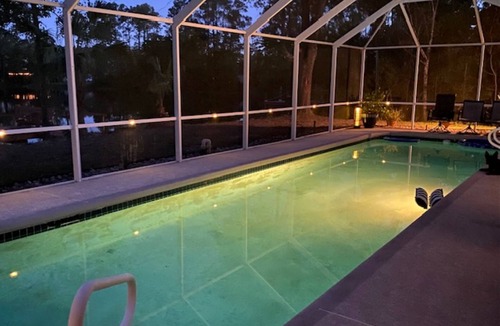 Palm Coast House | Stunning Lake house,heated pool, pet friendly, fishing spot ,restaurants ,bars