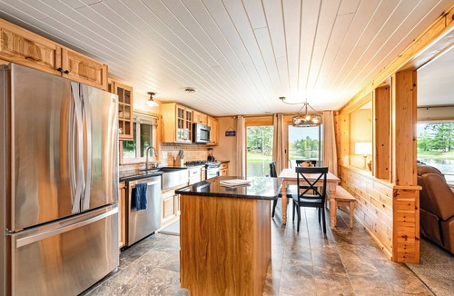Alger Cottage | Stunning Lakefront Cottage with Beach & Hot Tub