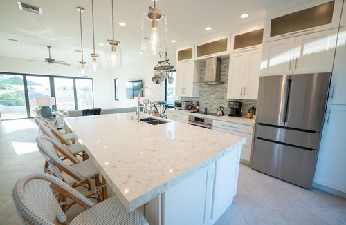 Bonita Springs Villa | STUNNING new home! Gulf & Bay views, 2 min walk to beach, private pool/spa/dock