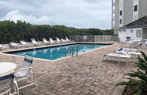 Stuart Condo | Stunning Oceanfront View 2BR Heated Pool steps to Beach & Tiki Bar Resort Access
