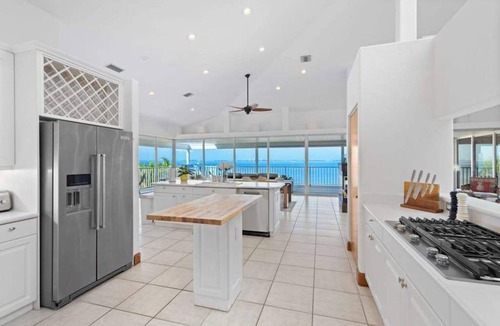 Bayshore Gardens House | Stunning waterfront retreat w panoramic view, spectacular sunsets & Heated pool