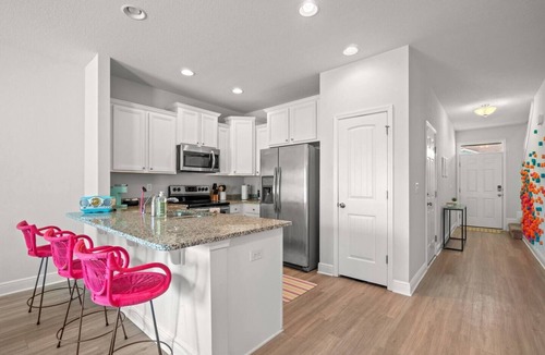 Thomas Drive House | Stylish New Build!★3 Miles→Beach★Pool Access