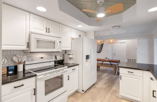 Port Charlotte House | Stylish retreat with Heated Saltwater Pool Beautiful home near Charlotte Harbor!