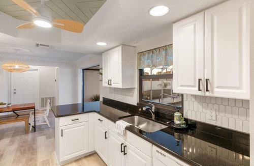 Port Charlotte House | Stylish retreat with Heated Saltwater Pool Beautiful home near Charlotte Harbor!
