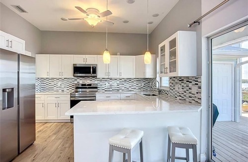 Bayshore Gardens House | Summer Price Break!3BD 3BA Townhome Side B Bring Your Boat!