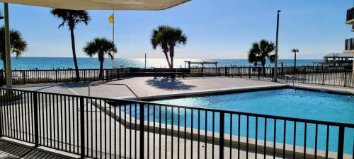 Panama City Beach Apartment | Sunbird Resort Ground Floor Gem with Ocean Views! Free Beach Chairs and Umbrella! by Dolce Vita Getaways PCB