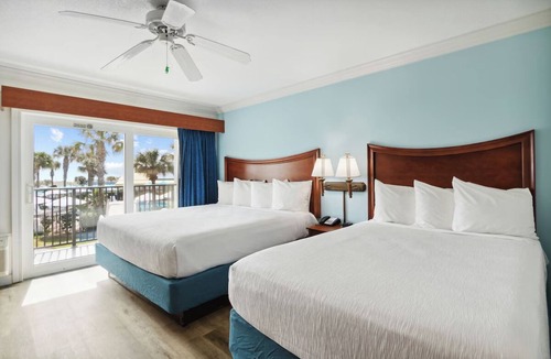 Neptune Beach Hotel | Sunlit Ocean View Suite, Ideal for Relaxing Family Getaways with Outdoor Pool