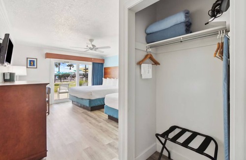 Neptune Beach Hotel | Sunlit Ocean View Suite, Ideal for Relaxing Family Getaways with Outdoor Pool