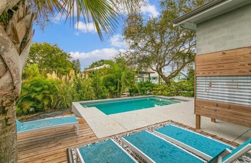 Butler Beach House | Swim & Dock in Style Art Deco Beach Escape