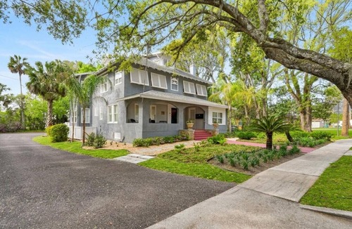 Rogers Deland House | The Arbor | Beautifully Restored 2BR Flat, Treetop Views, Stetson & Downtown