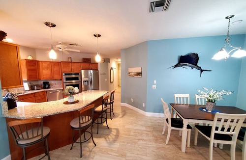 Fort Pierce Shores House | The Beach House Retreat Resort-Style Pool & Coastal Elegance