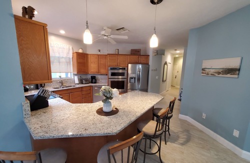 Fort Pierce Shores House | The Beach House Retreat Resort-Style Pool & Coastal Elegance