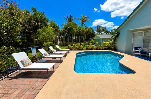 Fort Pierce Shores House | The Beach House Retreat Resort-Style Pool & Coastal Elegance