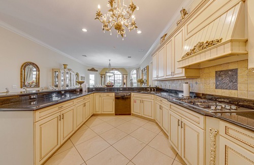 West Kissimmee Villa | The Formosa Grand Mansion! Lakefront! Infinity Pool & Spa! Cinema! Pure Luxury!
