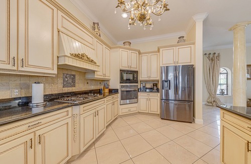 West Kissimmee Villa | The Formosa Grand Mansion! Lakefront! Infinity Pool & Spa! Cinema! Pure Luxury!