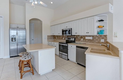 Yacht Club Villa | The Hammock - Beautiful Gulf access - 4 bedroom home - with heated pool