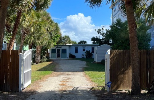 Port Canaveral House | The Iconic Mulvaine Beach House by the Pier with top viewing for space launches