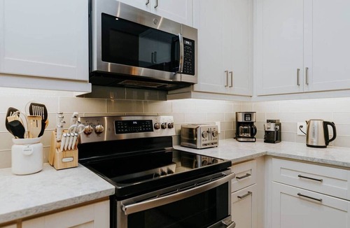 Bellevue Terrace House | THE PALMIERI luxe home with incredible pool area near DT SRQ
