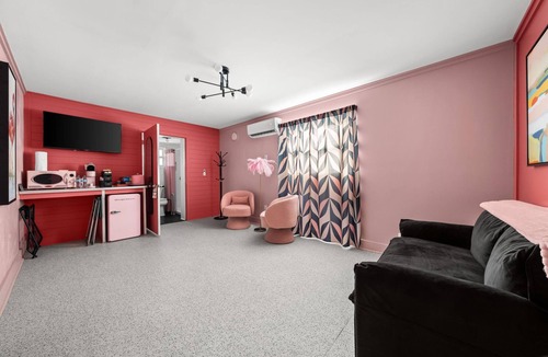 Port St. Joe Condo | The Pink Flamingo - Private Boutique Motel, Heated Pool, Sleeps 28, Near Beach!