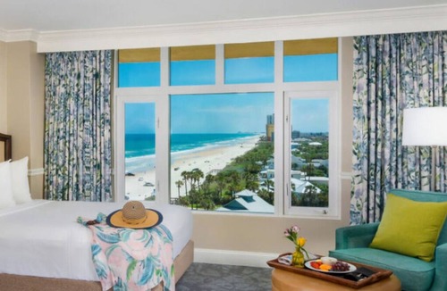 Daytona Beach Shores Hotel | The Shores | Coastal King Balc | Beach yoga, spa, s’mores