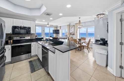 Panama City Beach Condo | The Sunset at Calypso | West-End Corner Beachfront Residence-Steps to Pier Park