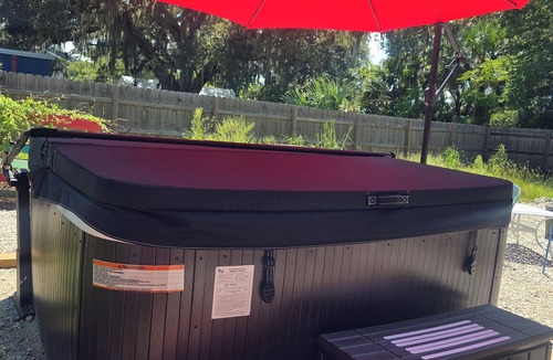 New Smyrna Beach House | The TRAIN House 3/2 w/HOTTUB, WiFi, In delightful New Smyrna deck, grill,dogs ok