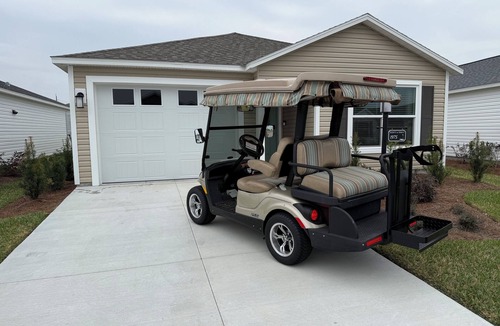 Candler House | The Villages-Adorable Patio Villa with golf car located close to entertainment.