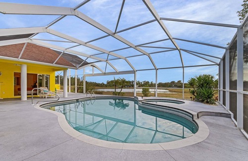 Eisenhower House | The Yellow | Lakefront Home, Heated Pool & Spa