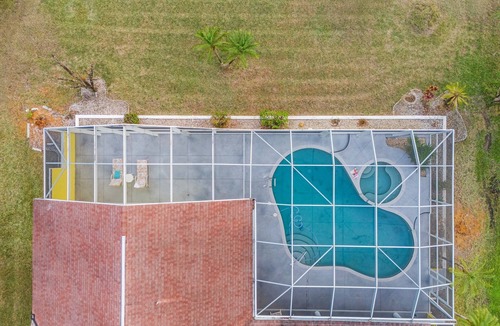 Eisenhower House | The Yellow | Lakefront Home, Heated Pool & Spa