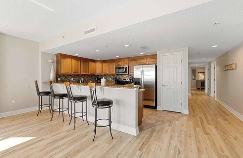 Daytona Beach Condo | This 8th-floor 3BR/3BA beachfront condo in Daytona Beach Shores offers stunning ocean views. Steps from the Atlantic Ocean, enjoy the beach, pool, or jacuzzi, then watch sunsets over the Intracoastal and downtown from your private balcony.
