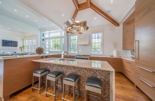Stone Harbor House | This exquisite showplace in Stone Harbor will make your beach vacation the most memorable! The contemporary design highlighting a serene and luxurious feel.