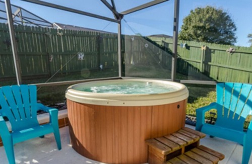 Orange Tree Villa | Totally Private backyard for relaxing in the pool and hot tub.