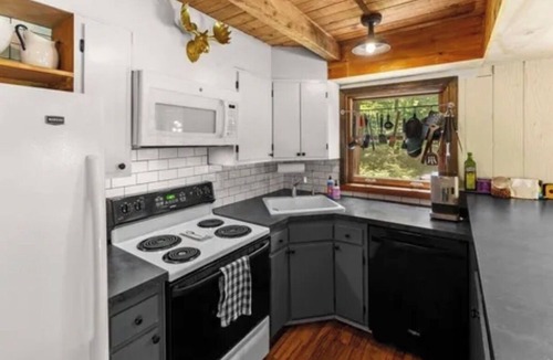 Margaretville House | Tranquil cedar cabin on 13 private acres with hot tub and outdoor shower.