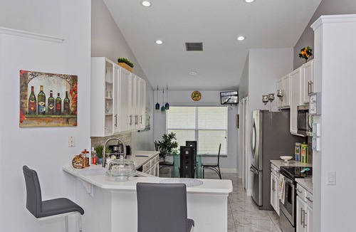 Eagle Pointe South House | Tranquil Times: Theater, Heated pool, Outdoor BBQ 6 miles from Disney