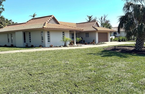 Longboat Key House | Tranquil Waterfront home- Water, peace, sunshine, & sand, this is your place.