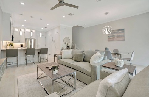 Stuart House | Tranquil Waters New Waterfront Townhome - Boat slip with lift included.