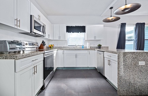 Tampa Heights House | Trendy 7 Bedroom Home | Private Heated Pool