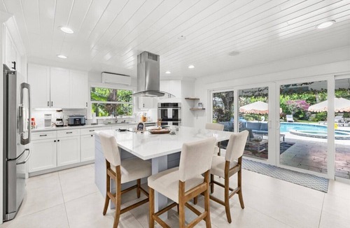 Ellenton House | Trophy Fish at the Oasis — Resort-style living for groups who want more than just a place to sleep.